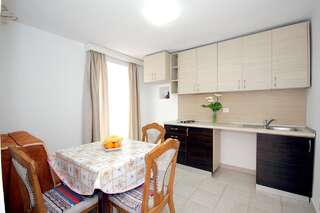 Апартаменты Apartments Pavlovic Петровац Трехместный номер с террасой-4